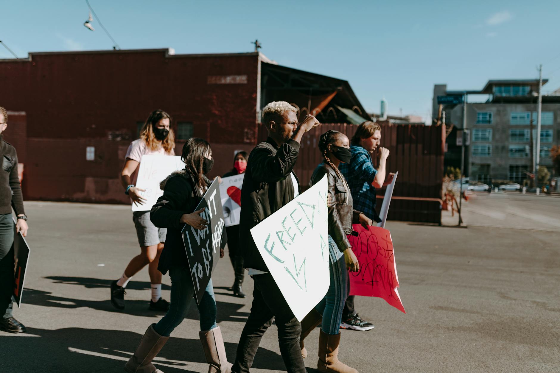 MARCH — to walk in a group as a protest