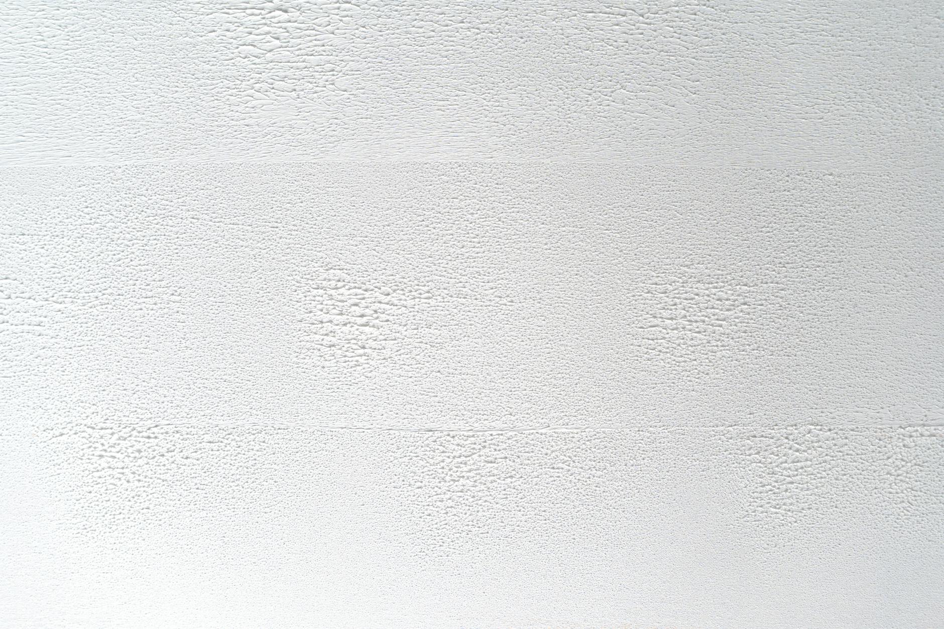 WALL — an upright structure forming the sides of a room