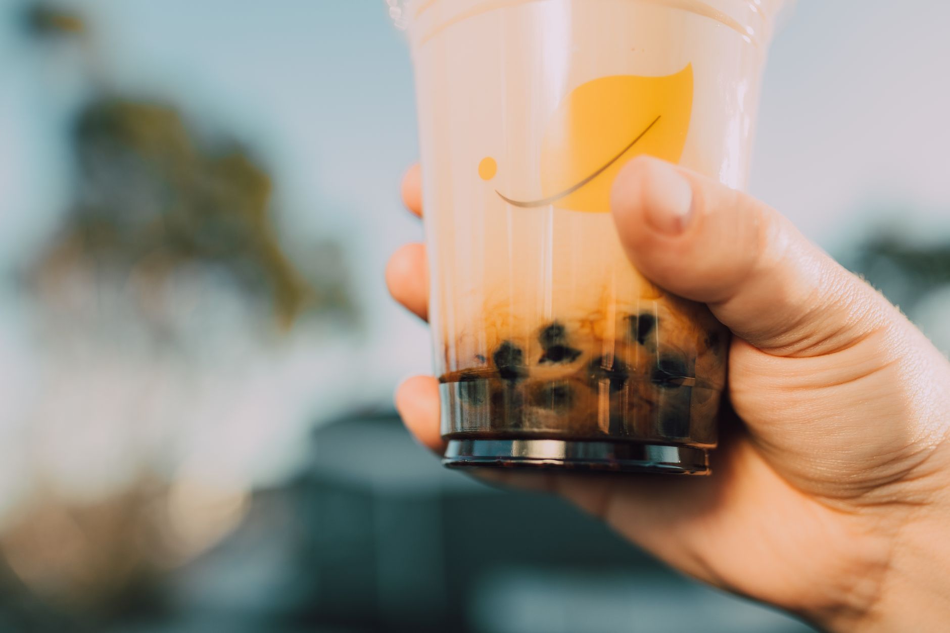 BUBBLE TEA: a drink with chewy pearl bubbles