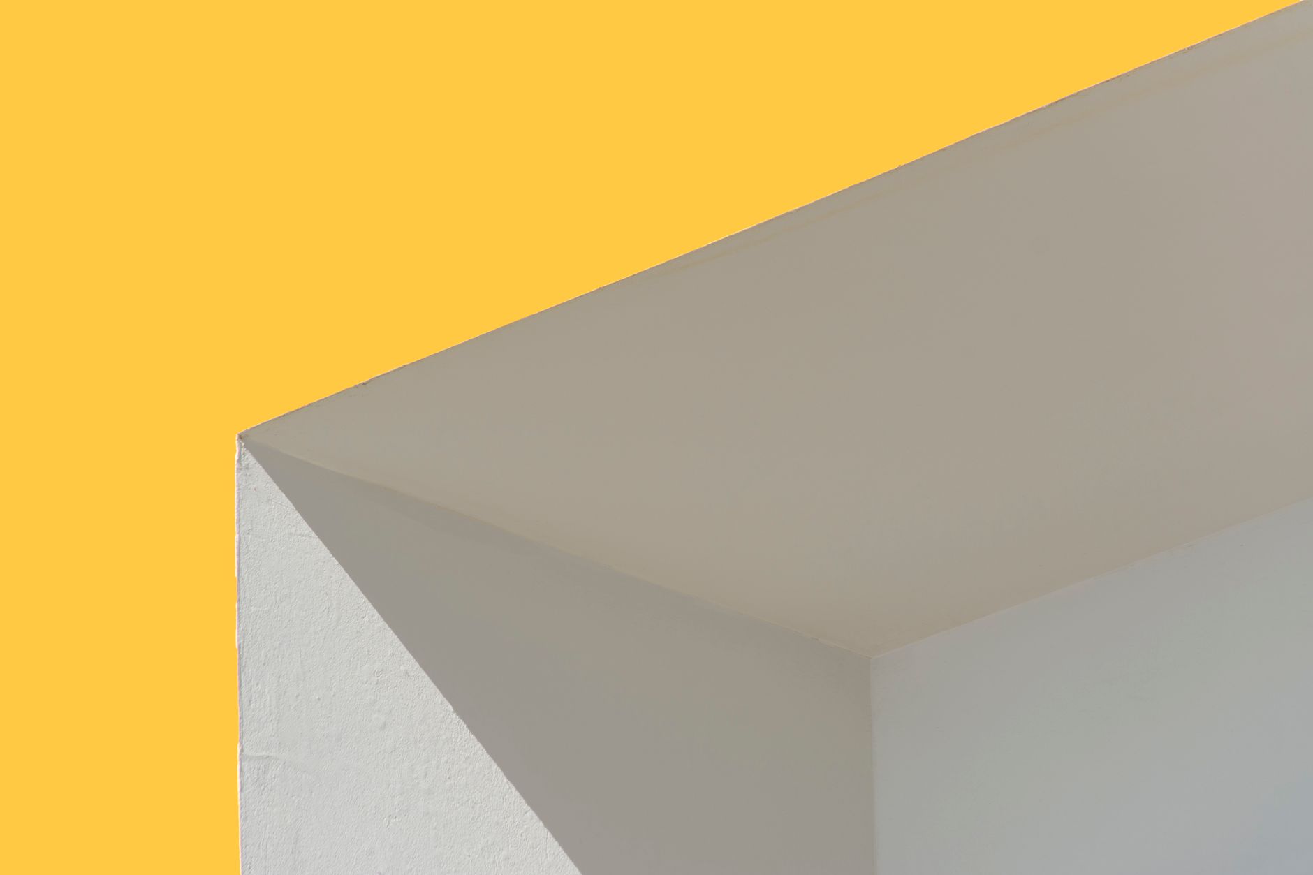 ANGLE BRACKET — a corner metal bracket forming an angled V-like shape