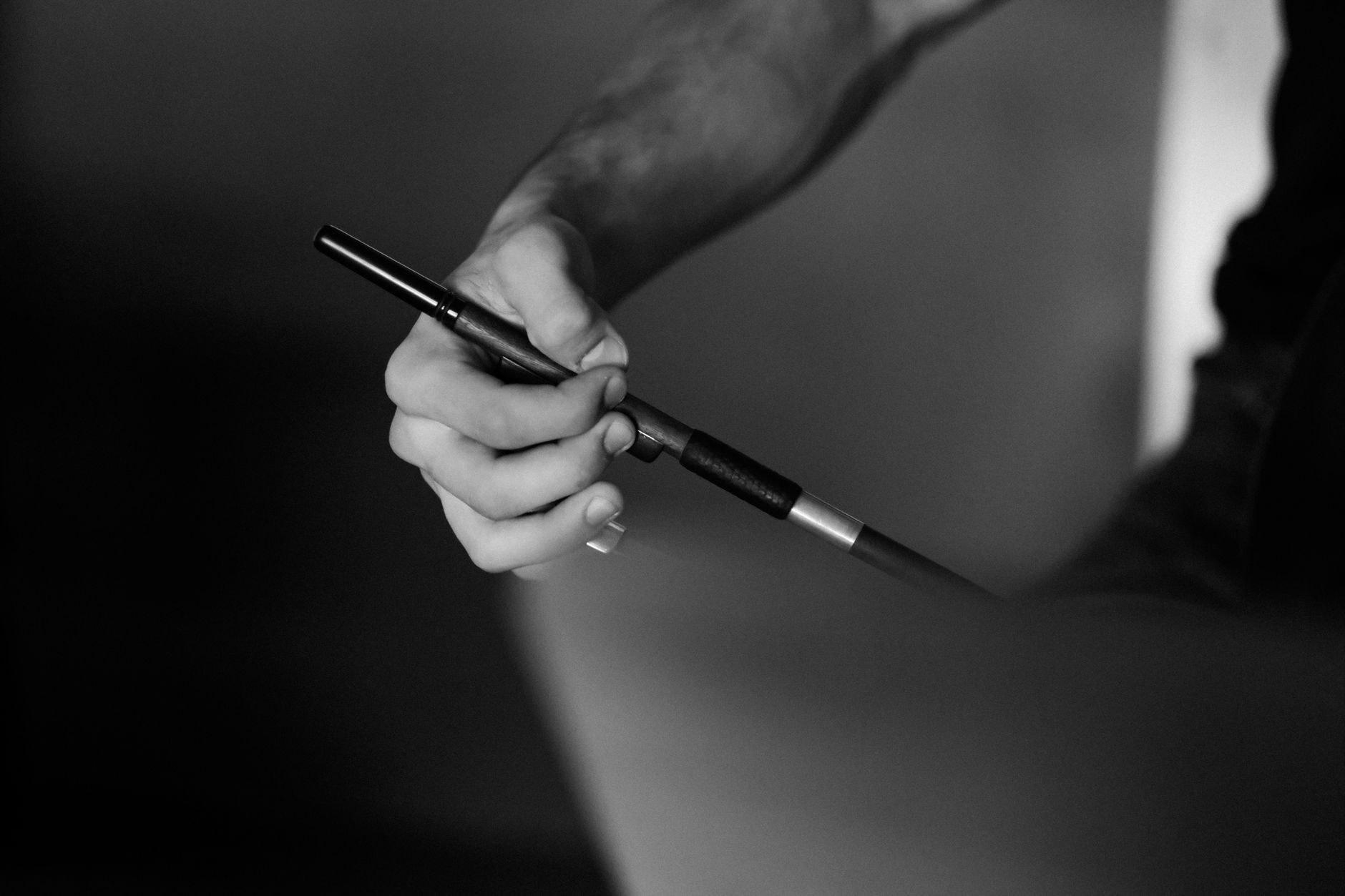 BOW meaning: the violin bow used to play the strings