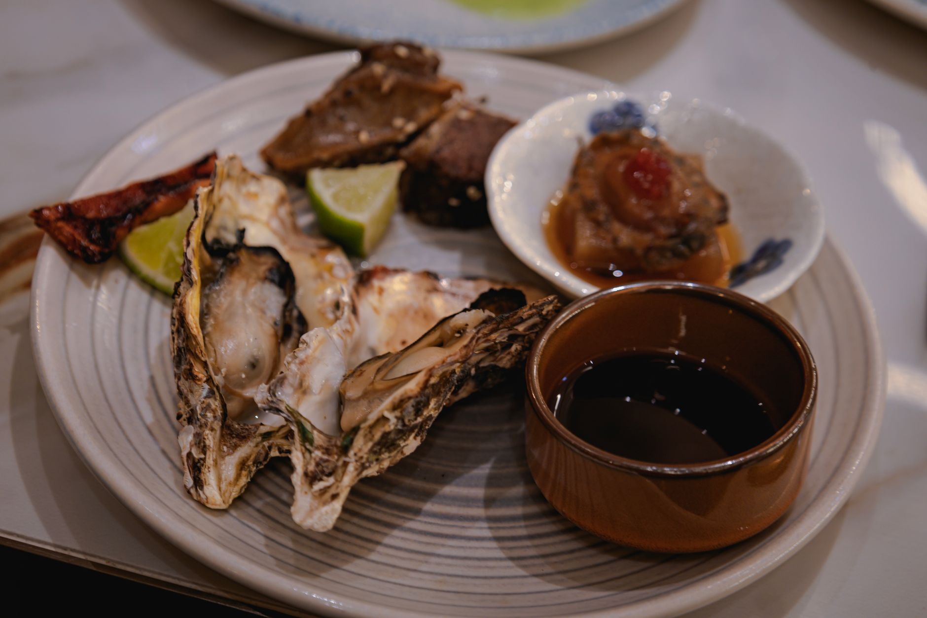 HORSERADISH meaning a pungent condiment often served with oysters